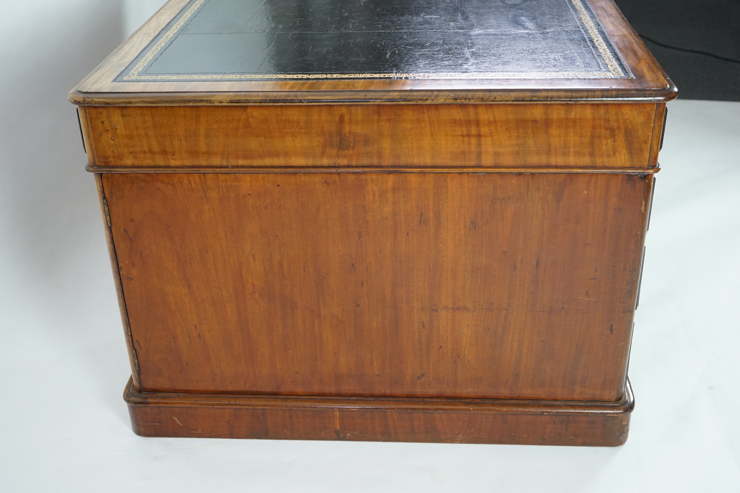 A Victorian mahogany partner's desk